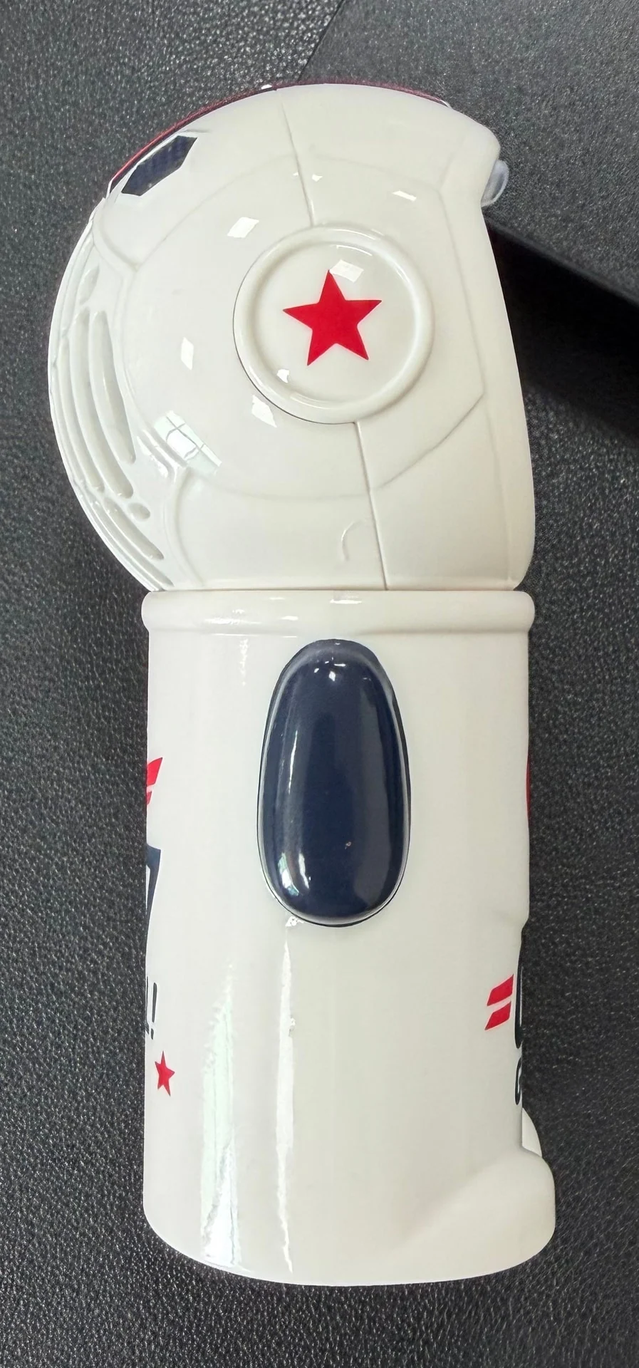 Side · Navy side arm and red accents